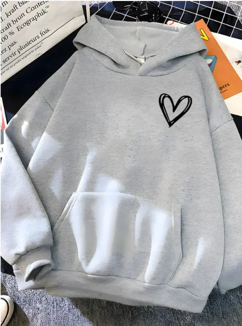 Sudadera con capucha y corazón cósmico de Kivara